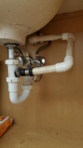 clean out under faucet sink for leaking ac