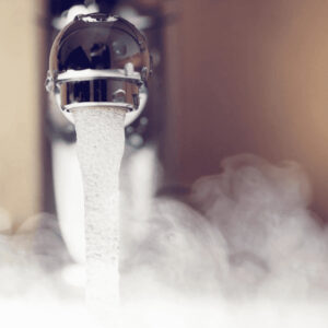 hot water coming out of a faucet from a water heater installation