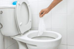 clogged drain in toilet caused by flushing wet wipe