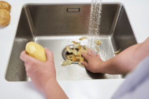 vegetable peels causing clogged drain