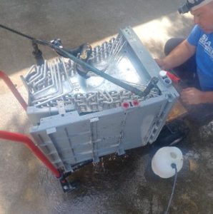 tech working on an AC repair